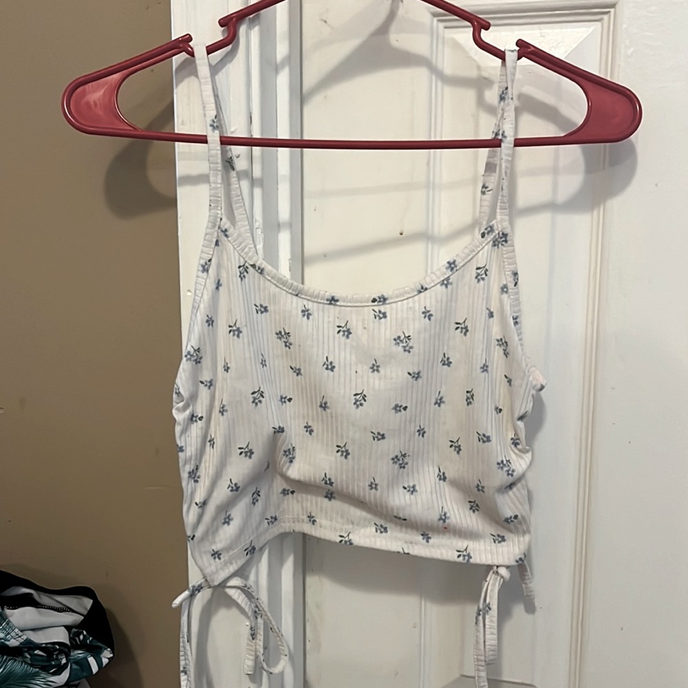 Size small, white crop top with blue flowers, good condition worn once.